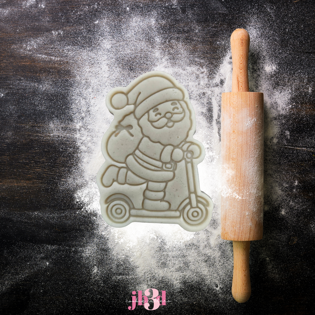 Santa on a scooter - Cutter & Embosser Stamp
