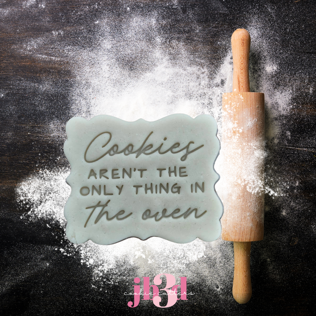 Cookies aren't the only thing in the oven. - Cutters & Embosser Stamps